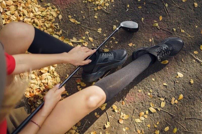 Trolley mit Golfausrüstung